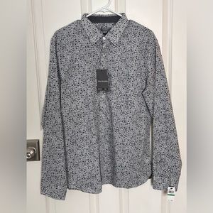 Van Heusen Men’s Never-tuck Shirt